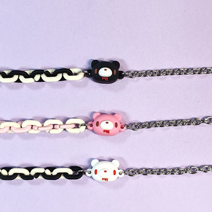 Set of three bracelets with cute bear charms in black, pink and white. Color - contrasting chains make them trendy and charming.