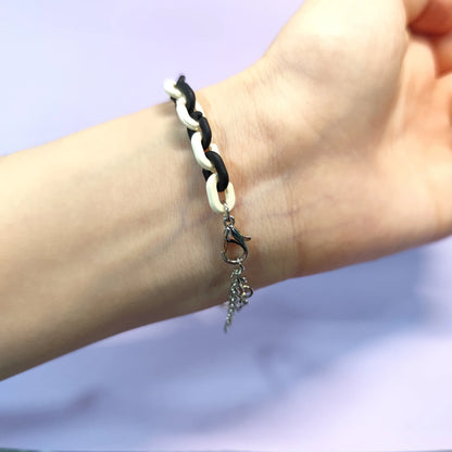 Set of three bracelets with cute bear charms in black, pink and white. Color - contrasting chains make them trendy and charming.