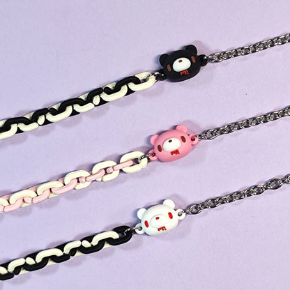 Set of three bracelets with cute bear charms in black, pink and white. Color - contrasting chains make them trendy and charming.