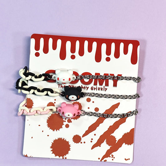 Set of three bracelets with cute bear charms in black, pink and white. Color - contrasting chains make them trendy and charming.