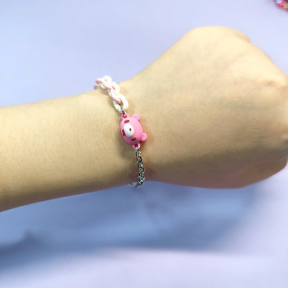 Set of three bracelets with cute bear charms in black, pink and white. Color - contrasting chains make them trendy and charming.